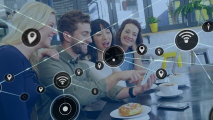Poster - Animation of network of connections with icons over diverse business people using tablet