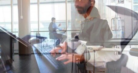 Poster - Animation of caucasian man using computer over business people in office