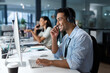 © Nicholas Felix/peopleimages.com - Dedicated service creates dedicated customers. Shot of a young man using a headset and computer in a modern office.