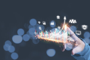 Hand of businessman touching pointing virtual screen on growth graph business with copy space. Investment stock market traded graph financial for-profit corporate in the future. Funds, digital assets.