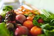 © Wavebreak Media - Close-up of fresh organic vegetable variations on kitchen counter at home