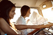 © Nikish H/peopleimages.com - You never know where life will take you. Shot of two friends reading a map on their road trip.