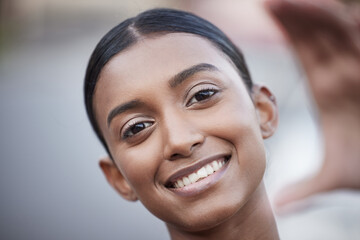 Poster - Its a bright and beautiful day to get moving. Portrait of a sporty young woman taking selfies while exercising outdoors.