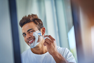 Poster - Not today beard. Shot of a handsome young man shaving his facial hair in the bathroom.