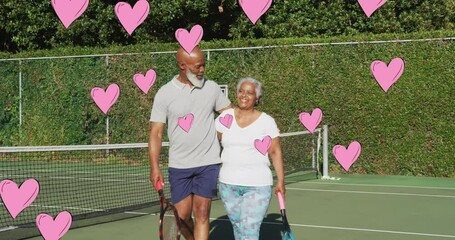 Poster - Animation of pink hearts over smiling senior african american couple embracing outdoors after tennis