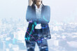 Attractive young european businesswoman standing on abstract blue city background with index, candlestick forex chart and mock up place. Success, fintech, transform and trade concept. Double exposure.