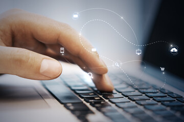Aufkleber - Close up of hand using laptop with abstract SEO search and communication hologram on blurry background. Double exposure.
