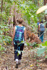 Canvas Print - Beautiful female tourist in the Tangkoko nature reserve on the Indonesian island of Sulawesi, on a ecotourism jungle hike 