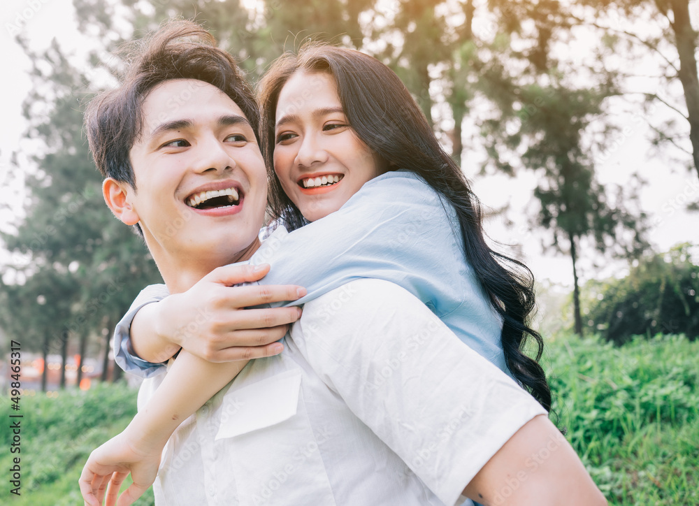 Portrait of young Asian couple outside Stock Photo | Adobe Stock