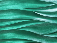 Emerald 3D Interior Decorative Wall Panel With Wavy Pattern. Texture Of Pearl Green Background. Abstract Backdrop.