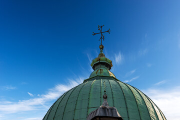 Poster - Treviso Cathedral (Duomo o Cattedrale di San Pietro Apostolo - Saint Peter the Apostle), VI-XIX century, Veneto, Italy, Europe. Architectural dome with religious cross on blue sky and clouds.