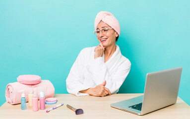 Wall Mural - senior gray hair woman smiling with a happy, confident expression with hand on chin.  skin care and shower concept