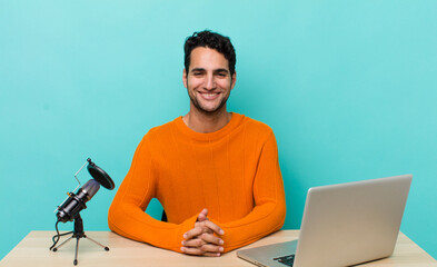 Poster - hispanic handsome man smiling happily with a hand on hip and confident. influencer concept