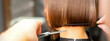 © okskukuruza - Haircut of short hair of young white woman by hands of a hairdresser in a hair salon, back view, close up