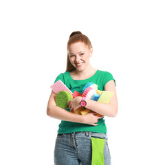 Wall Mural - Young woman with many sponges on white background