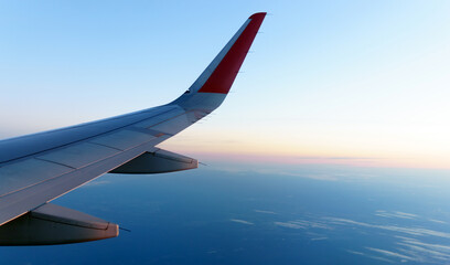 Wall Mural - the wing of the aircraft. for travel operators. the concept of travel