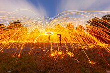Burning Steel Wool Spinning. Showers Of Glowing Sparks From Spinning Steel Wool