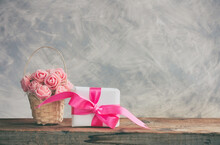 Basket With Roses, Gift Box With Pink Bow, Gray Wall