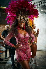 Sometimes youve just gotta samba. Cropped portrait of a beautiful samba dancer performing in a carnival with her band.