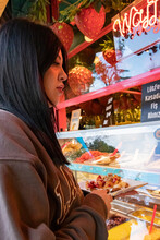 Young Woman Ordered Waffle. A Signboard Which Is Written ''Please Get A Receipt From The Cashier.'' In Turkish. 
