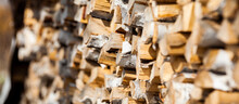 Birch Firewood Stacked In A Woodpile