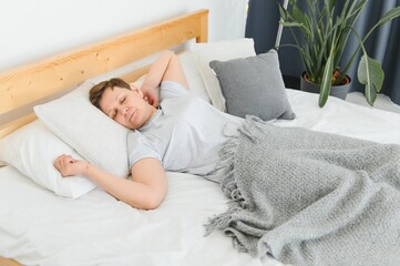 Wall Mural - Closeup of woman asleep in bed.