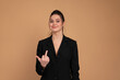 © Andrii - Business woman showing abuse gesture. Irritated smiling female in business suit showing middle finger, impolite rude gesture of disrespect, expressing hate and aggression in conflict