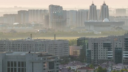 Wall Mural - Elevated morning view over the city center and central business district timelapse, Kazakhstan, Astana