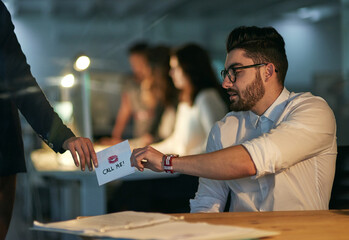 Aufkleber - Office romance. Cropped shot of a love note being passed from one colleague to another.