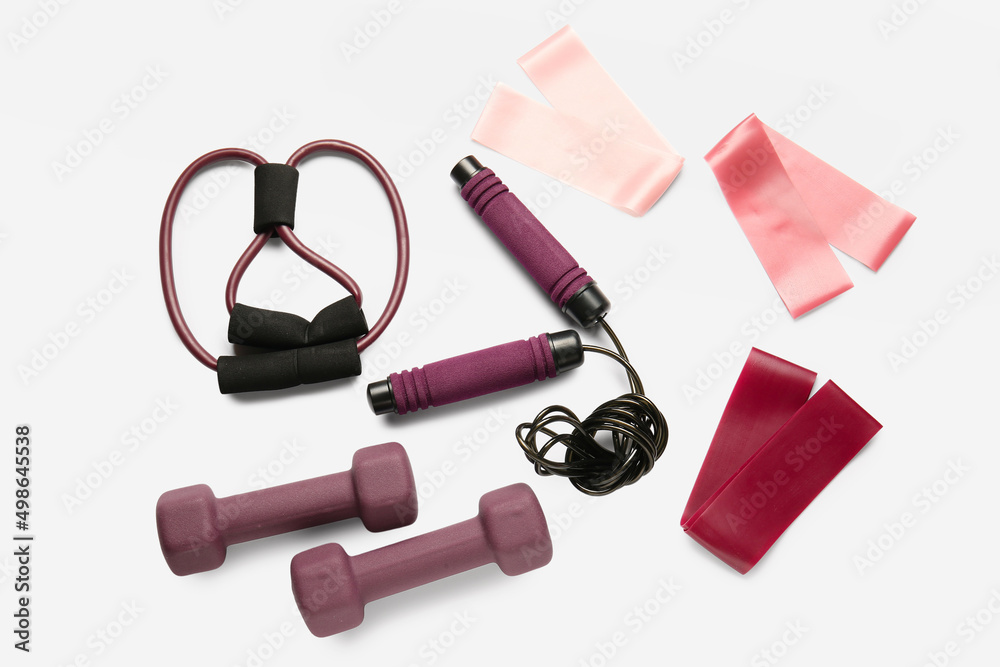 Stylish sport equipment on white background