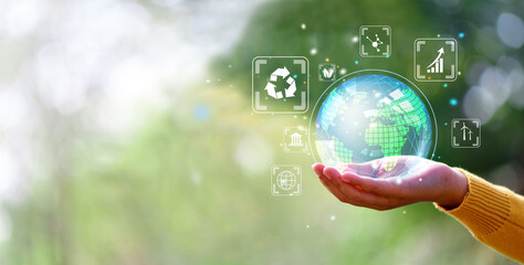 Wall Mural - hand holding green leaf with net-zero icons. co2 net-zero emission - carbon neutrality concept.
