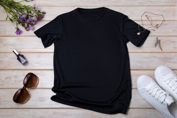 Wall Mural - Womens black T-shirt mockup with burdock flowers