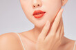 © Tuan  Nguyen  - A close view of model showing lip posing with hand for cosmetic advertising