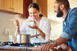© Nicholas Felix/peopleimages.com - Lets see how good your cooking is. Shot of a couple cooking together at home.