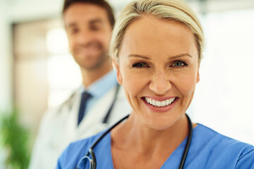 Aufkleber - What would a doctor be without his nurse. Portrait of two happy healthcare practitioners posing together in a hospital.