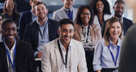 Poster - Learning lots and staying inspired. Shot of a group of businesspeople attending a conference.