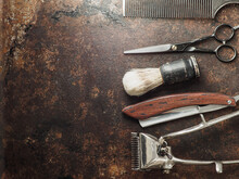 Vintage Barber Tools: Dangerous Razor, Hairdressing Scissors, Old Manual Clipper, Comb, Shaving Brush