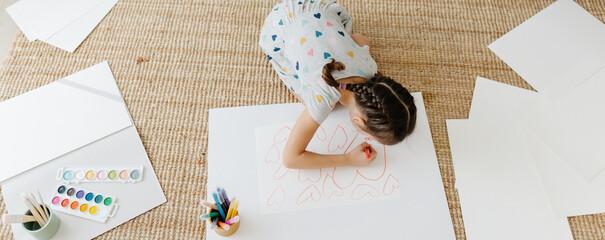 Wall Mural - Child drawing a lot of hearts