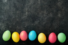 Easter Eggs. Dyed Easter Eggs With Marble Stone Effect Ref And Blue Color In Rustic Style On Dark Stone Background. Easter Background. Top View.
