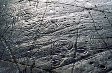 Cup And Ring Mark Marks Prehistoric Neolithic Rock Art On Natural Rock Outcrop At Achnabreck In Kilmartin Valley, Argyll, Scotland, UK