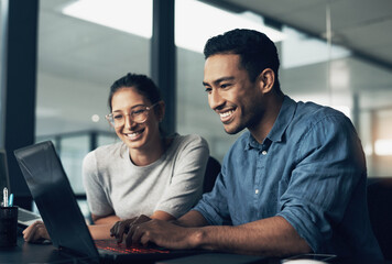 Poster - Pick of the litter, never bitter. Shot of two young workers using a laptop in a modern office.