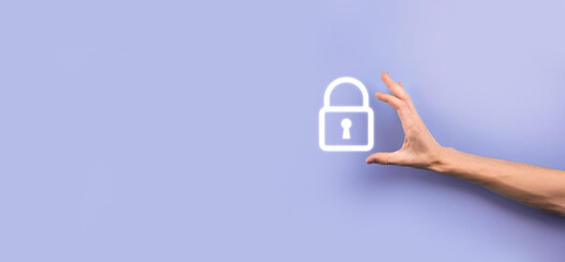 Male hand holding a lock padlock icon.Cyber security network. Internet technology networking.Protecting data personal information on tablet. Data protection privacy concept. GDPR. EU.Banner