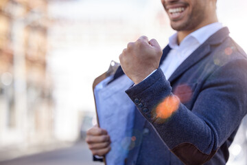 Aufkleber - Celebrating my career success. Shot of a businessman cheering in excitement while holding a clipboard.