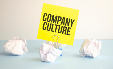 COMPANY CULTURE text on notepad with pen