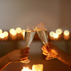 Canvas Print - Heres to a romantic night. Cropped shot of an unrecognizable couple toasting while on a date.