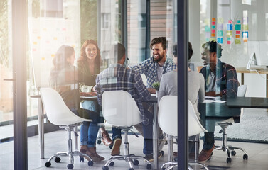Poster - Having a productive office meeting. Shot of a group of colleagues having an office meeting.