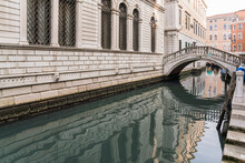 Canal And White Building In Venice, Italy 