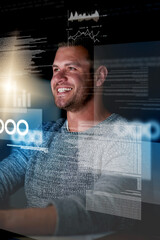 Aufkleber - Watching his code in action. Shot of a smiling computer programmer working at his computer late at night.