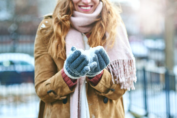 Aufkleber - Now I just have to make a snowball. Shot of an unrecognizable woman enjoying being out in the snow.