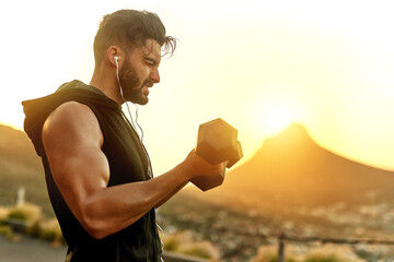 Poster - Lifting in the great outdoors. Shot of a young man exercising outdoors.